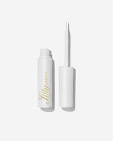 Lilly Lashes clear glue with brush-on applicator for precise lash placement.