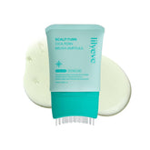 Lily Eve ScalpTurn bottle with built-in brush for mess-free scalp care