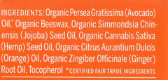 Applying Dr. Bronner's lip balm on lips for smooth, conditioned lips.