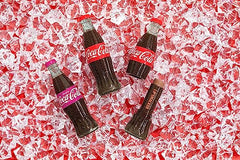 Lip Smacker Coca-Cola bottle gloss captures subtle shine for a healthy-looking pout.
