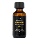 Live Bearded Tombstone Beard Oil bottle pouring for smooth application and hydrated skin