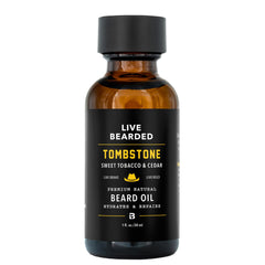 Live Bearded Tombstone Beard Oil bottle pouring for smooth application and hydrated skin