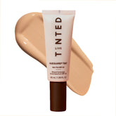 Live Tinted Hueguard bottle closeup for portable mineral sunscreen.