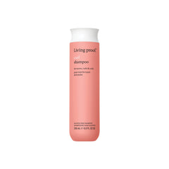 Living Proof Curl Shampoo bottle front view for defined curls.