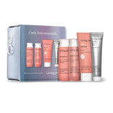 Living Proof Curly Hair Essentials Kit travel-size shampoo for stronger, defined curls and reduced frizz.