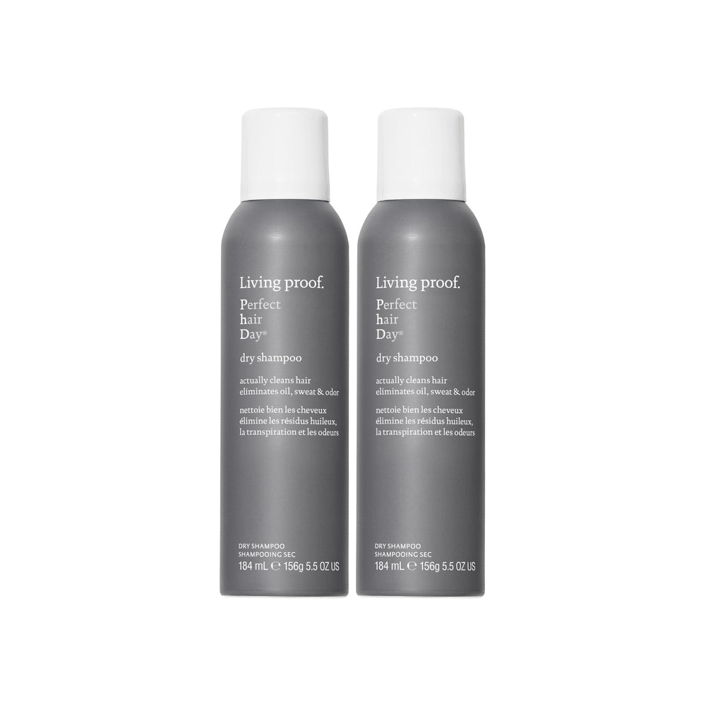 Living Proof Dry Shampoo bottle close-up illustrating root oil absorption.