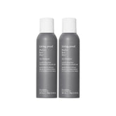 Living Proof Dry Shampoo bottle close-up illustrating root oil absorption.