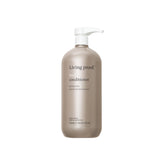 Living Proof No Frizz Conditioner bottle pour showing frizz control in action