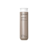 Living Proof No Frizz Conditioner bottle promises frizz control for all hair types.