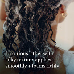 Cleanses to remove dirt and oil with No Frizz Shampoo for refreshed hair.