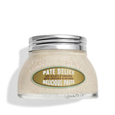 L'OCCITANE almond delicious paste jar close-up for gentle exfoliation.