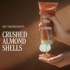 L'Occitane Almond Shower Scrub gel texture ready to cleanse.
