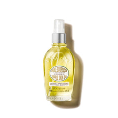 L'OCCITANE Almond Supple Skin Oil bottle pour showcases rich hydration for the skin.