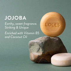 Detail of jojoba oil highlighting nourishing ingredient for moisturized scalp.