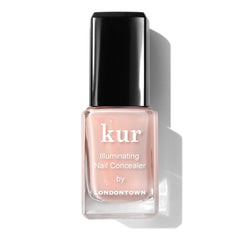 LONDONTOWN Bubble Illuminating Nail Concealer en tono rosado, cubre descoloración con brillo natural.