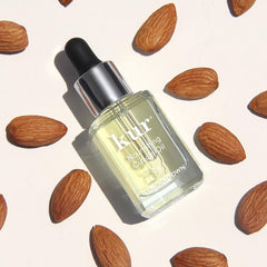 LONDONTOWN Fresh Glow Cuticle Remover in action melts buildup around cuticles.