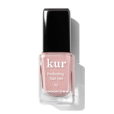 LONDONTOWN Perfecting Nail Veil dusty rose bottle showing sheer color and conditioning care.