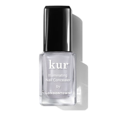 LONDONTOWN Quartz Illuminating Nail Concealer bottle front showing milky quartz gray shade for brightening nails.