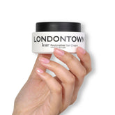 LONDONTOWN Restorative Nail Cream bottle highlights nourishing repair for dry nails