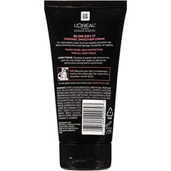 L'Oreal Paris Thermal Smoother Cream on dispenser demonstrates quick application for sleek results.