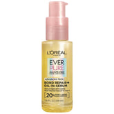 L'Oreal Paris Bond Repair+ Aceite en Suero, botella, protección del calor para cabello dañado.