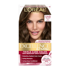 L'Oreal Paris Excellence Creme color cream packaging highlighting triple care system for gray coverage.
