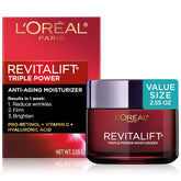 L'Oréal Paris Revitalift Triple Power jar close-up showing rich anti-aging cream texture for smoother skin