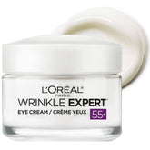 L'Oreal Paris Wrinkle Expert 55+ crema de ojos, empaque visible para uso diario, beneficio de cuidado continuo.
