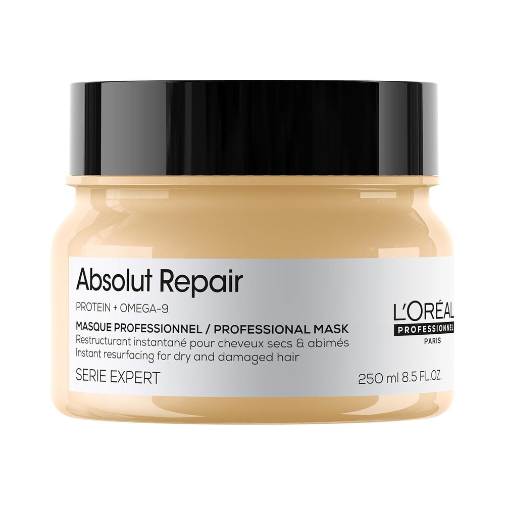 L'Oréal Professionnel Paris Absolut Repair Mask bottle pour provides lightweight hydration for dry hair.