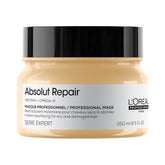 L'Oréal Professionnel Paris Absolut Repair Mask bottle pour provides lightweight hydration for dry hair.