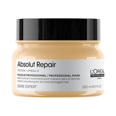 L'Oréal Professionnel Paris Absolut Repair Mask bottle pour provides lightweight hydration for dry hair.