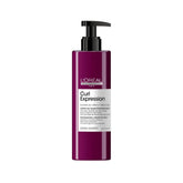 L'Oreal Professionnel Paris Curl Expression Activator bottle defines curls with light hold.