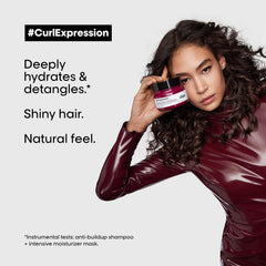 L’Oréal Curl Expression Mask being applied on hair shows detangling and smoother curls.