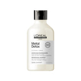 L’Oréal Professionnel Paris Metal Detox bottle pour cleanses mineral buildup and protects color