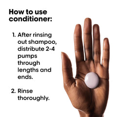Applying Vitamino Color Conditioner from mid-lengths to ends for smooth, color-safe detangling.