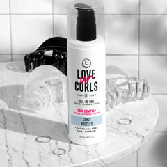 Love Ur Curls envase sin fragancia, ideal para piel sensible y cabello rizado.