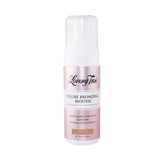Loving Tan Deluxe self tanning mousse bottle displays a natural bronze color for a sunless tan