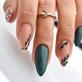 LPOODDNU almond press-on nails with dark green leaf design for stylish DIY manicure.