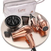 LURA dual voltage travel dryer with diffuser for smooth styling on the go.