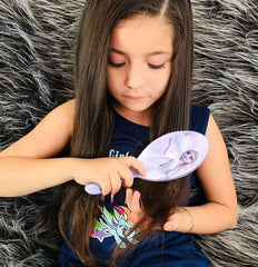 Luv Her Frozen Elsa hairbrush back design with playful Elsa art.