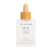 Lux Unfiltered N°12 bottle of fragrance-free tanning drops for a natural glow