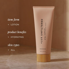 Hands applying Lux Unfiltered N32 for a streak-free tan