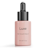 Luxe Cosmetics Hair Growth Serum bottle close-up for thicker, shinier hair.