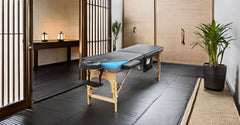 Luxton Home foldable portable massage table ready for transport and storage