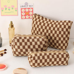 LYDZTION makeup brush storage bag keeps brushes protected during travel.