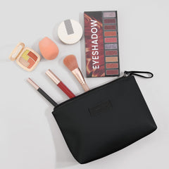 MAANGE cosmetic bag side view in black, ideal for purse organization.