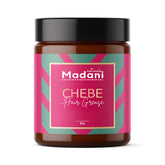 Madani Naturals Chebe Hair Grease bottle promoting scalp moisture and shine.