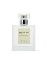 Maison Louis Marie No.04 Bois de Balincourt bottle front in warm amber glow