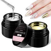 Makartt chrome gel nails in silver and gold with a high-gloss mirror finish.
