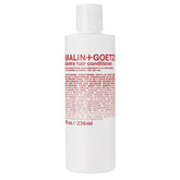 Malin + Goetz cilantro conditioner bottle close shows lightweight hydration for all hair types